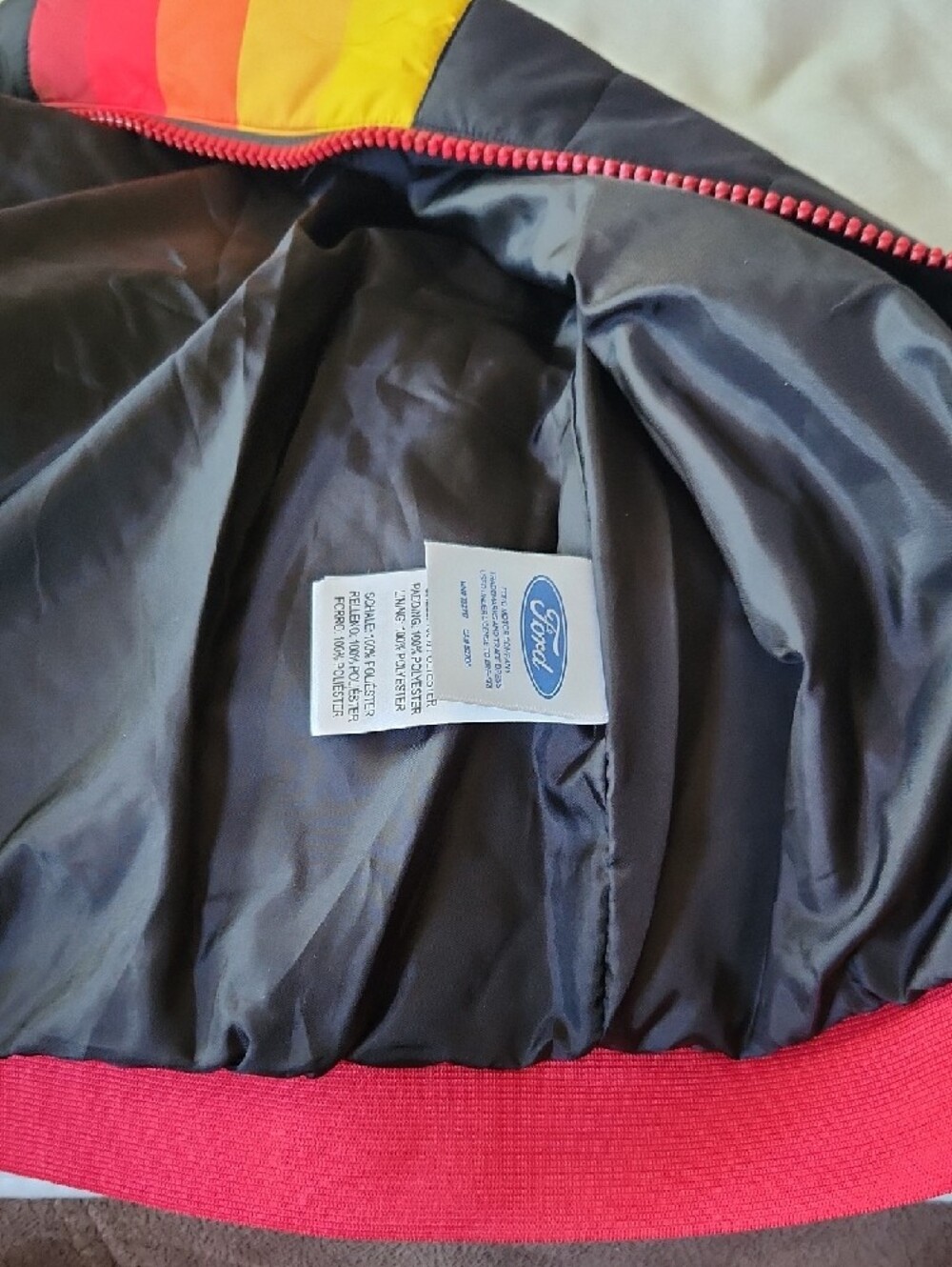 Official Ford Black Puffer Vest with Red, Orange & Yellow Stripes - Picture 8 of 8